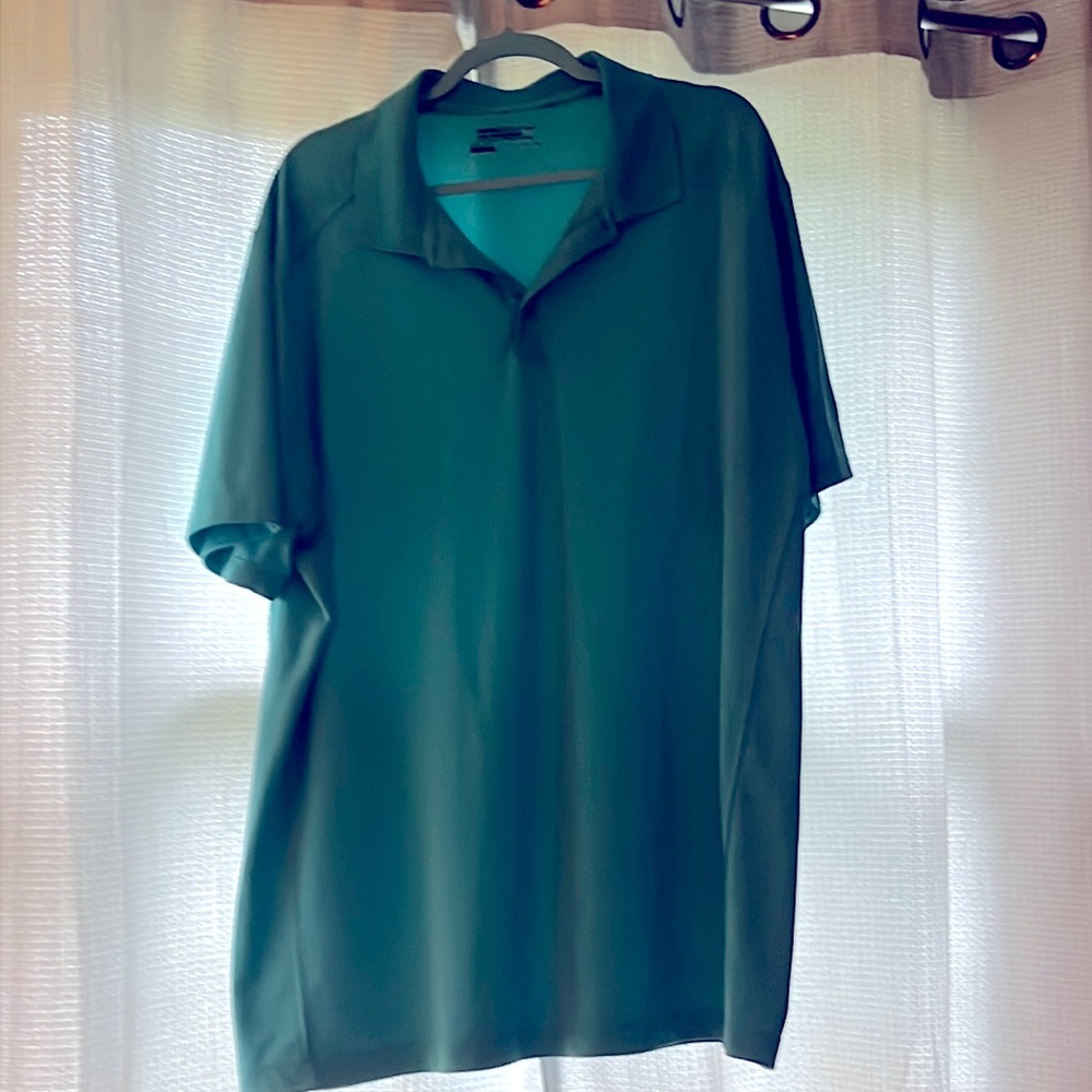 Nike Dri-Fit 3XL. Teal   Great looking shirt. Too big for me now.